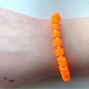Handmade clay bead bracelet orange beads white seed beads stretch